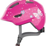 ABUS Smiley 3.0 kinderhelm - fietshelm met lage pasvorm, kindvriendelijke designs & ruimte voor een varkensstaart - voor meisjes en jongens - roze met vlindermotief, maat M